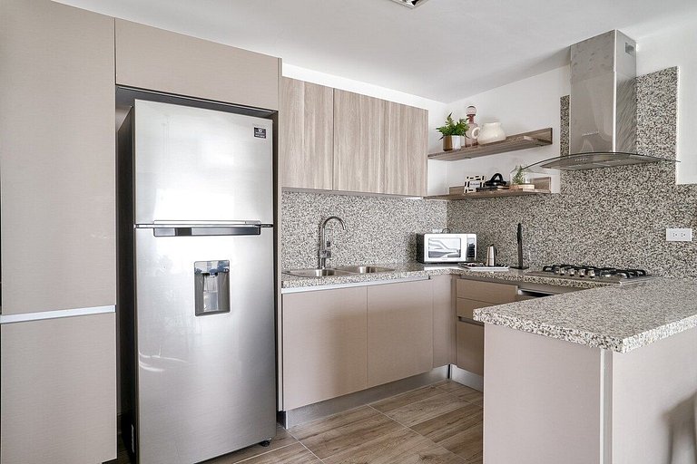 Cozy 1BR near Blue Mall with pool and fast wifi in Piantini