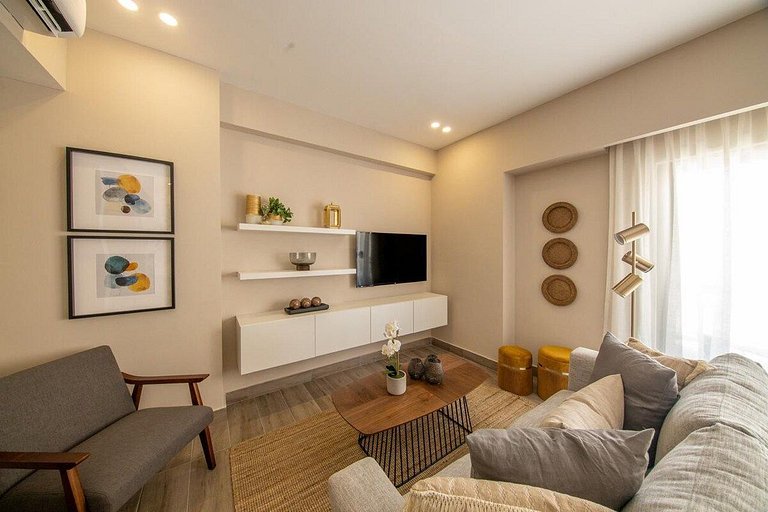 Designer condo near Blue Mall with rooftop pool and city vie