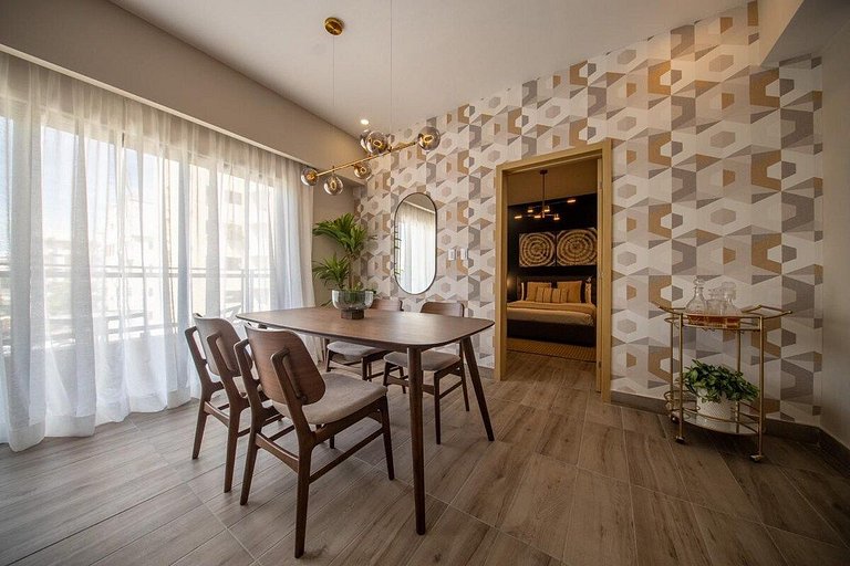 Designer condo near Blue Mall with rooftop pool and city vie