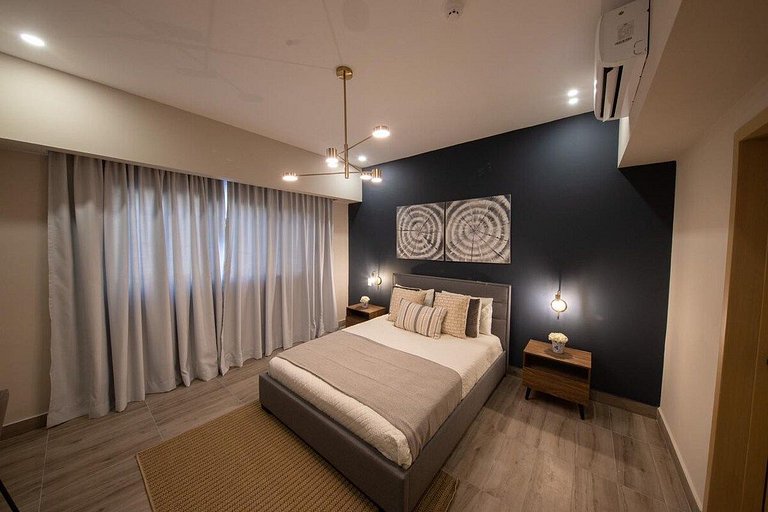 Designer condo near Blue Mall with rooftop pool and city vie
