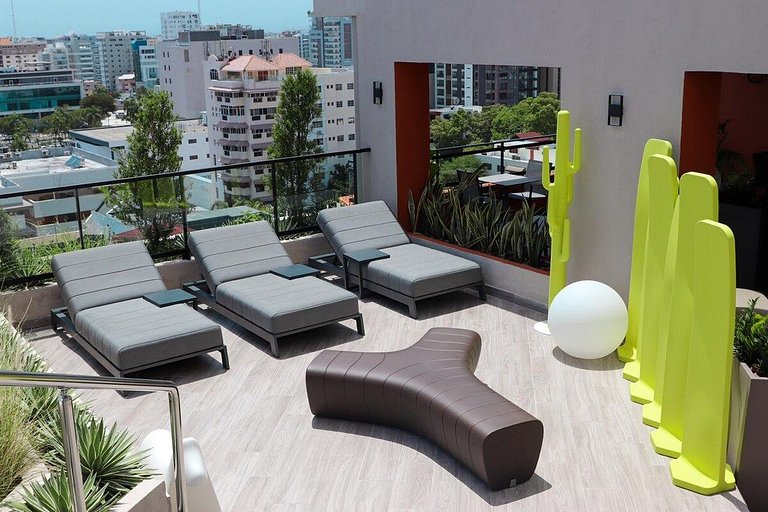 Designer condo near Blue Mall with rooftop pool and city vie
