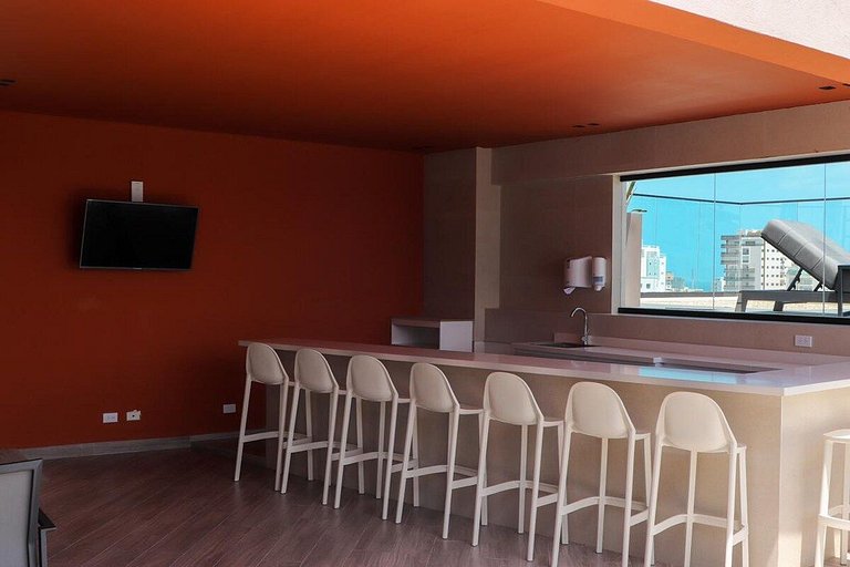 Designer condo near Blue Mall with rooftop pool and city vie