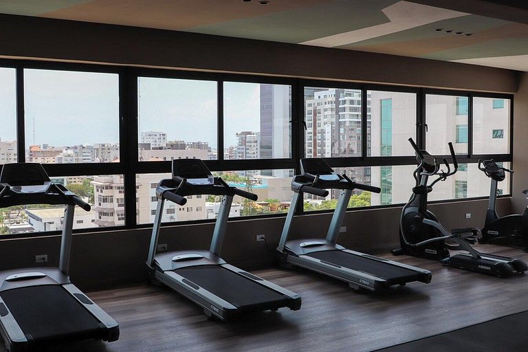Designer condo near Blue Mall with rooftop pool and city vie