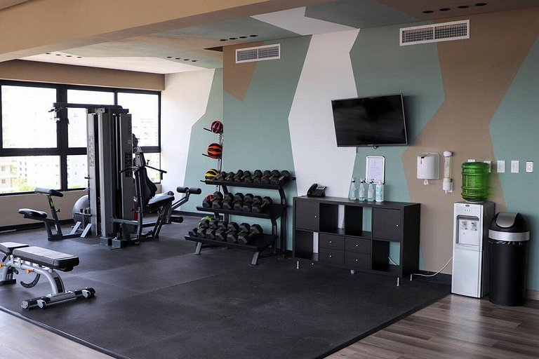 Designer condo near Blue Mall with rooftop pool and city vie