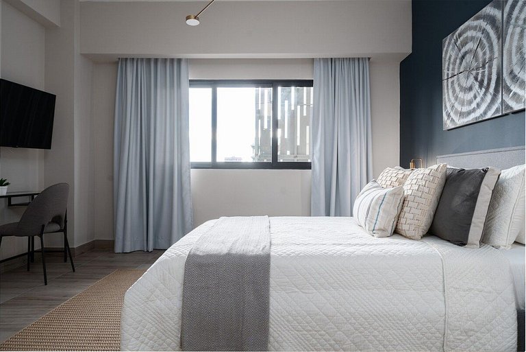 Designer condo near Blue Mall with rooftop pool and city vie