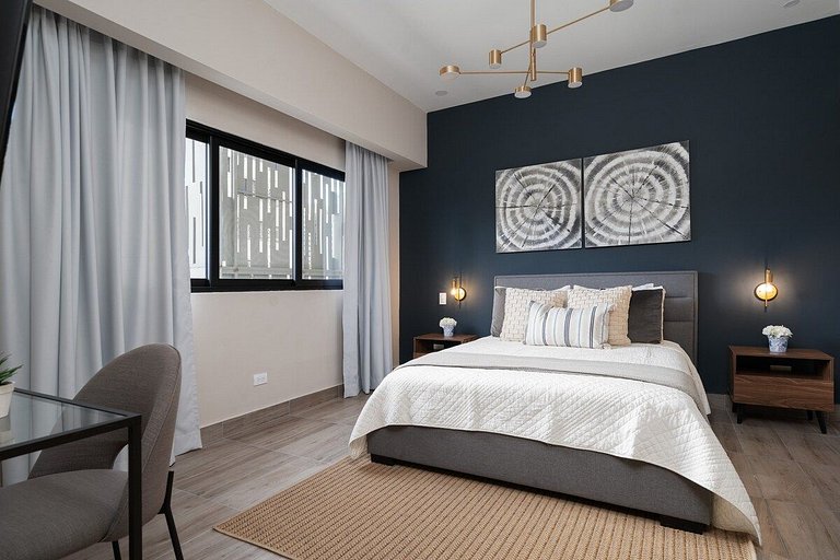 Designer condo near Blue Mall with rooftop pool and city vie