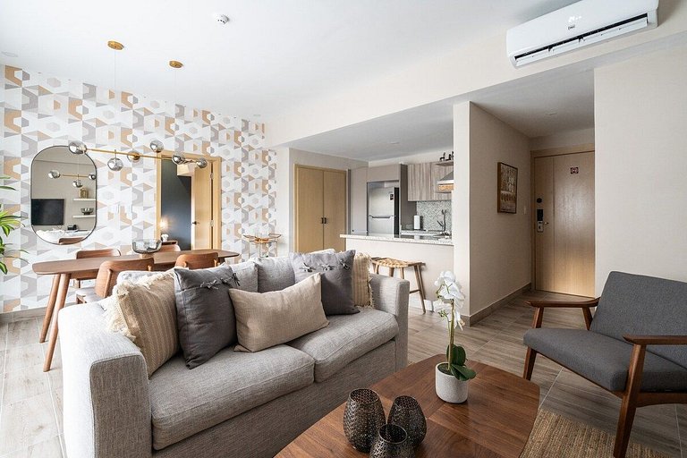 Designer condo near Blue Mall with rooftop pool and city vie