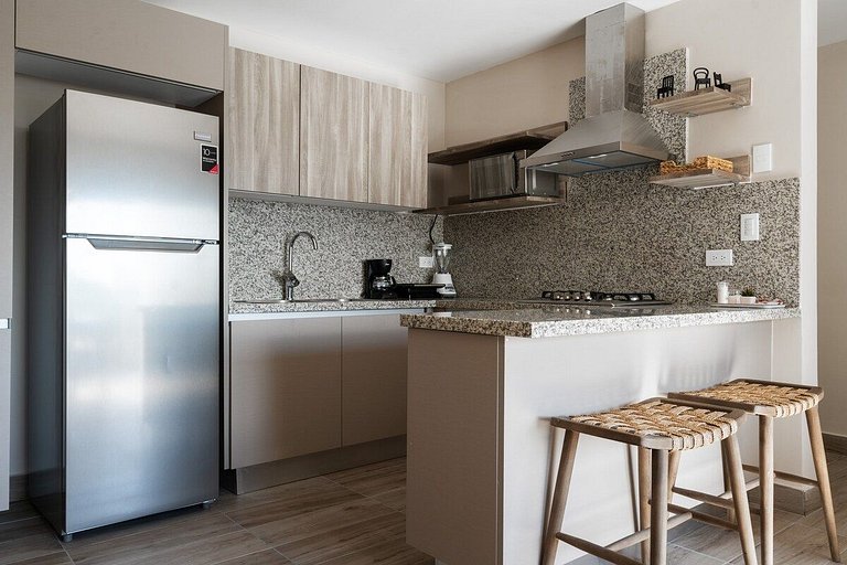 Designer condo near Blue Mall with rooftop pool and city vie