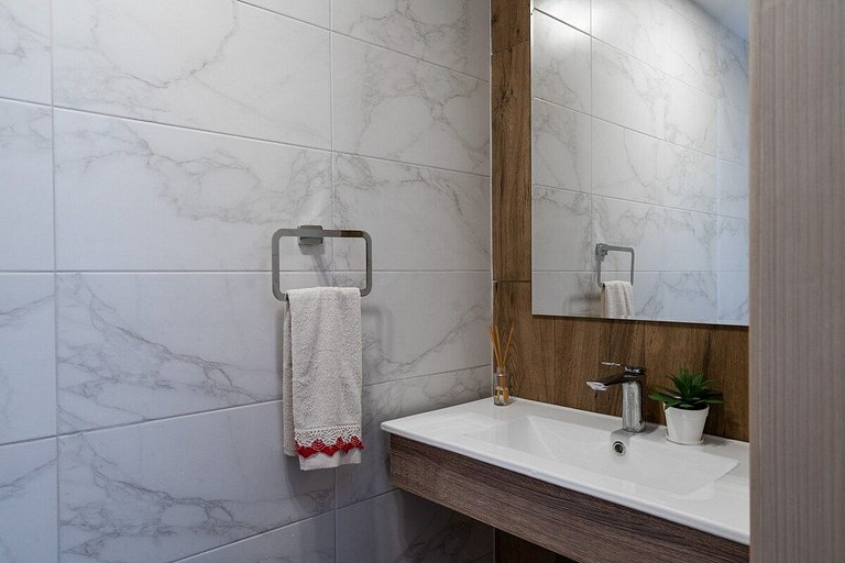 Designer condo near Blue Mall with rooftop pool and city vie