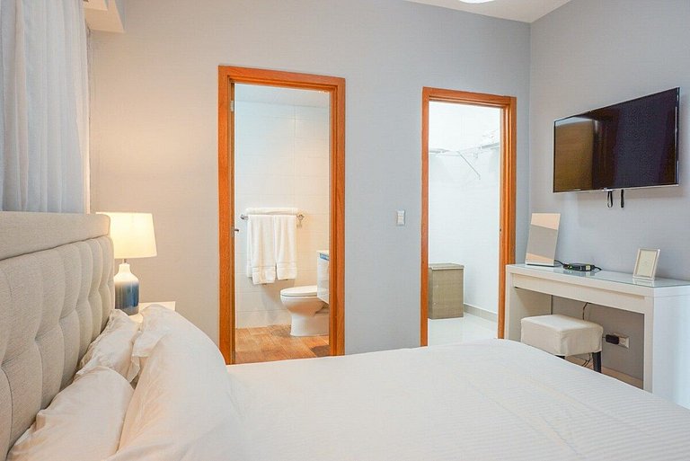 Modern 1BR apartment with wifi, AC, gym and view near Bluema