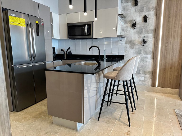 Chic 1BR Serrallés Retreat, Rooftop Pool|YellowKey