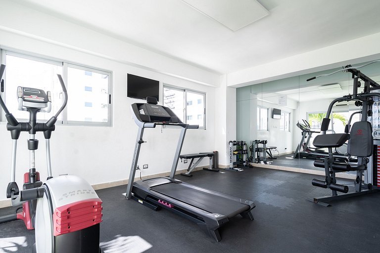 Cozy 1BR apartment in Piantini with wifi, AC and safe