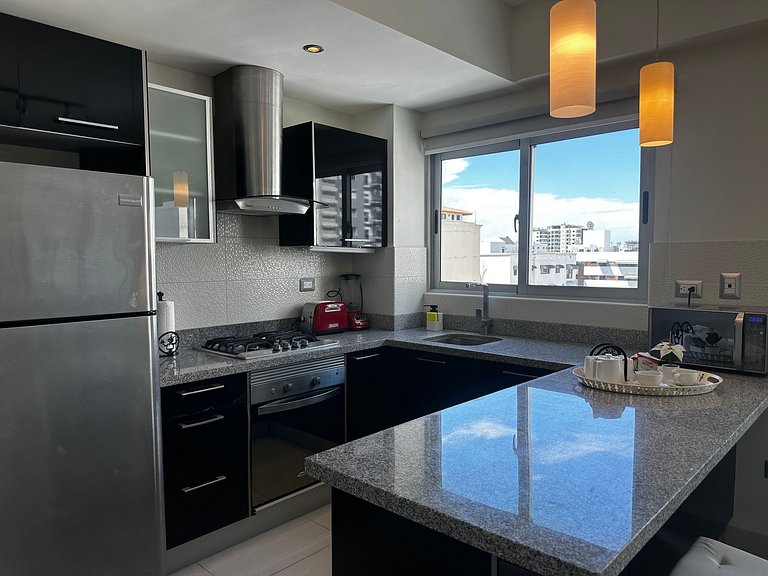 Cozy 1BR apartment in Piantini with wifi, AC and safe