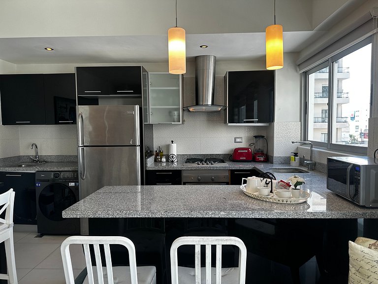 Cozy 1BR apartment in Piantini with wifi, AC and safe