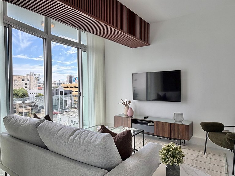 Piantini 1BR Near Blue Mall, Private Patio, Pool & Views