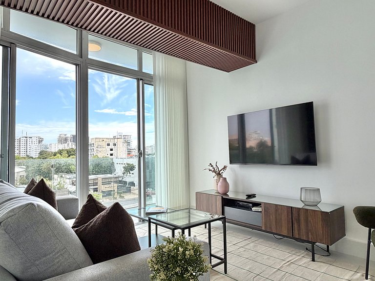 Piantini 1BR Near Blue Mall, Private Patio, Pool & Views